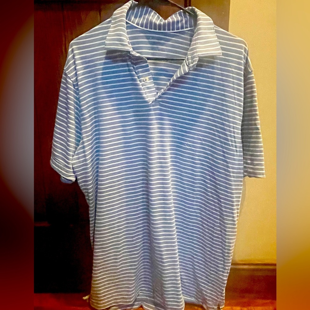Peter Millar seaside golf shirt. Smoke free home, no hole or stains. Very Nice